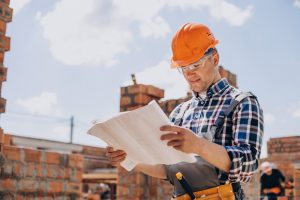 construtor trabalhando em obra é pago com recibo de pagamento autônomo
