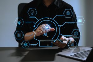  Pessoa seleciona ícone de IA na tela virtual, que está interligando outros sistemas, incluindo o de recrutamento inteligente
