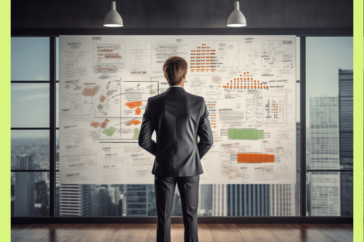 homem observa quadro em que é possível ter uma visão holística de seus projetos