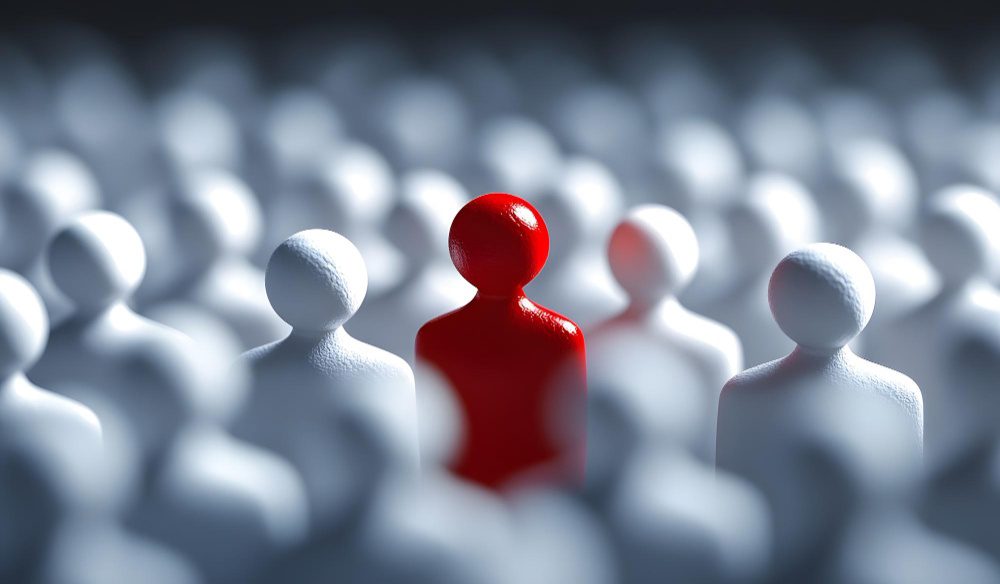 imagem com avatar vermelho, m meio a muitos cinzas, mostra indicadores de recrutamento e seleção